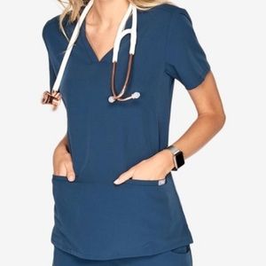 Figs three-pocket scrub top in dark harbor.